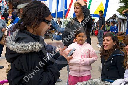 Teens socialize in the city of Ushuaia on the island of Tierra del Fuego, Argentina.