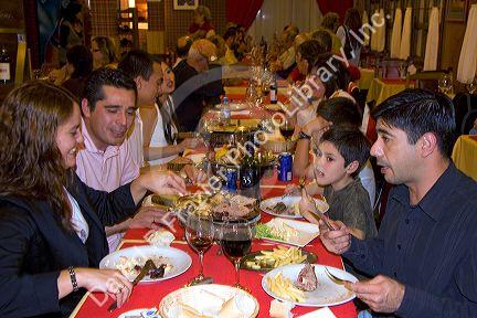 People dine in a restaurant at Ushuaia on the island of Tierra del Fuego, Argentina.