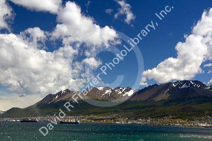 The harbor and city of Ushuaia below the Martial mountain range on the island of Tierra del Fuego, Argentina.