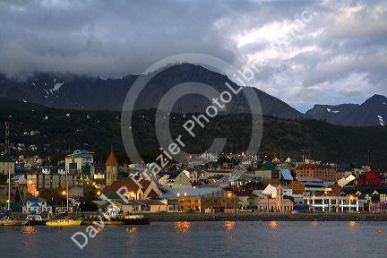 The harbor and city of Ushuaia at dusk on the island of Tierra del Fuego, Argentina.