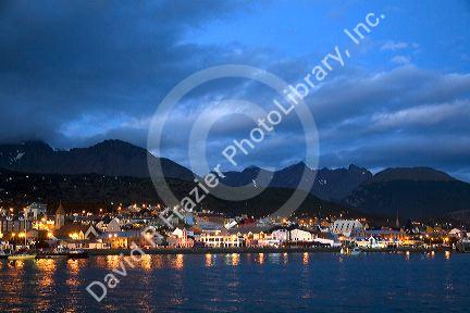 The harbor and city of Ushuaia at dusk on the island of Tierra del Fuego, Argentina.