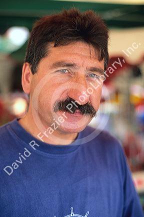 French man at market.
