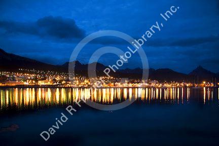 The harbor and city of Ushuaia at dusk on the island of Tierra del Fuego, Argentina.