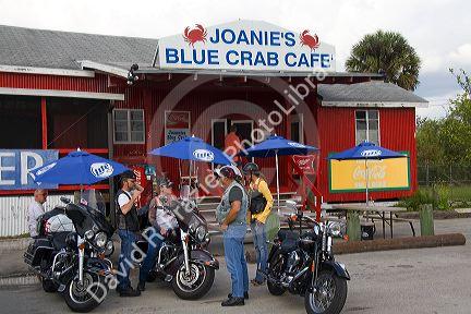Bikers in front of Joanie's Blue Crab Cafe along Tamiami Trail on U.S. Highway 41 in the Florida Everglades.