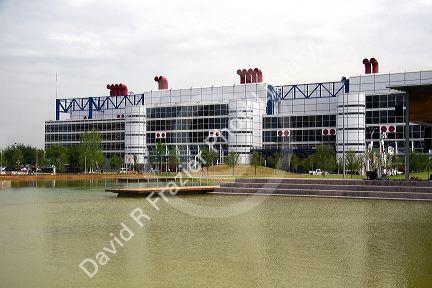 George R. Brown Convention Center and Kinder Lake at the Discovery Green public park in Houston, Texas.
