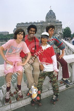 Ethnic diverse group of teenagers hanging out in Paris, France.