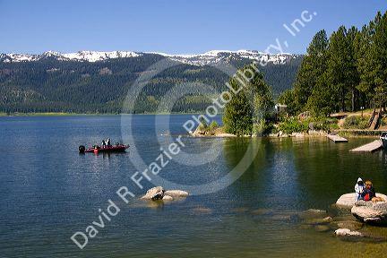 Bass fishing boat on Cascade Lake in Valley County, Idaho. Winter image taken from same location. http://www.drfphoto.com/photo/16246/
