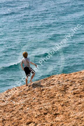 Children play on the dunes of Lake Michigan in Sleeping Bear Dunes National Lakeshore located along the northwest coast of the Lower Peninsula of Michigan.