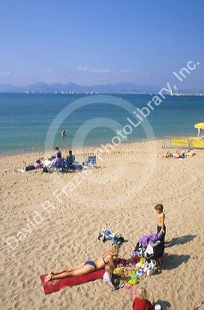 People on the beach in Cannes, France.  Beach in the area of Nice.