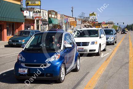 Smart car in a line of traffic at West Yellowstone, Montana.