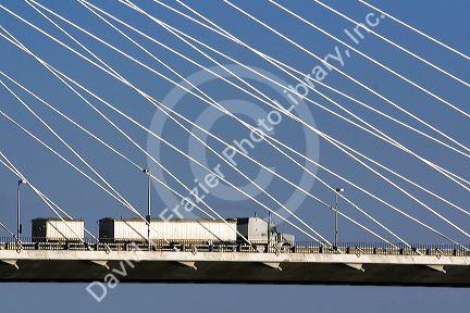Long haul truck crossing the Ed Hendler Bridge spanning the Columbia River between Pasco and Kennewick, Washington.