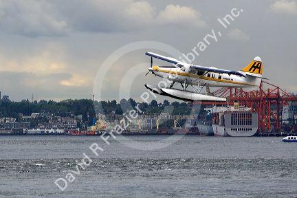Seaplane flying at Port Vancouver in British Columbia, Canada.