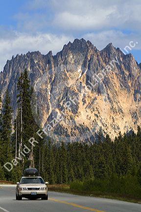 Automobile traveling on Washington State Highway 20 in the North Cascade Range, Washington.