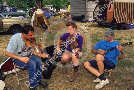 Musicians fiddling at the National Oldtime Fiddlers Contest in Weiser, Idaho.