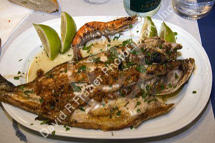A dish of fish and shrimp at a basque restaurant in the city of Bilbao, Biscay, Basque Country, northern Spain.