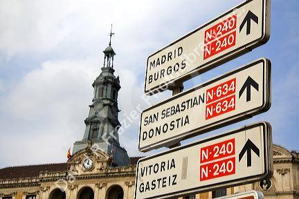Direction sign and city hall in the city of Bilbao, Biscay, northern Spain.