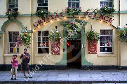 Father and son in front of the Crystal Palace pub in Bath, Somerset, England.