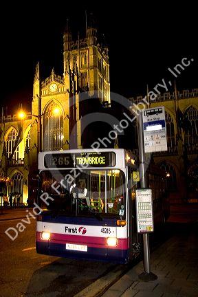 Bus stop in front of the Abbey Church of Saint Peter in the city of Bath, Somerset, England.