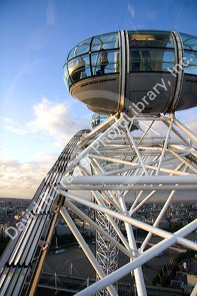 Tourists view the city of London from the London Eye, England.