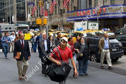 Pedestrians in Rockafeller Center, Manhattan, New York City, New York, USA.