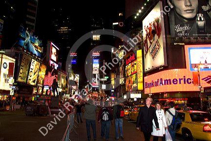 Times Square at night in Manhattan, New York City, New York, USA.