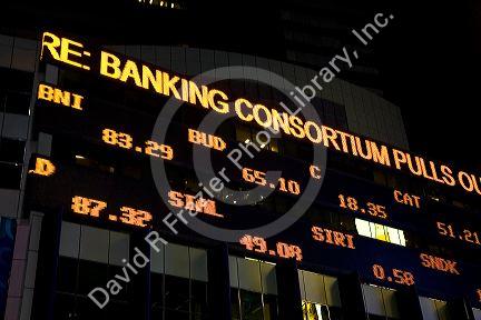 News and stock ticker in Times Square, Manhattan, New York City, New York, USA.