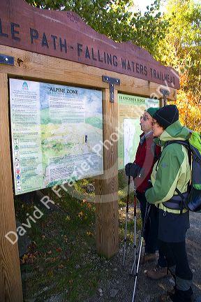 Hikers at the Bridle Path-Falling Waters Trail Head at Mount Lafayette of the Franconia Range in the White Mountain National Forest, New Hampshire, USA.