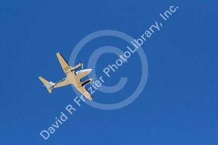 Beechcraft Kingair in flight over Boise, Idaho, USA.