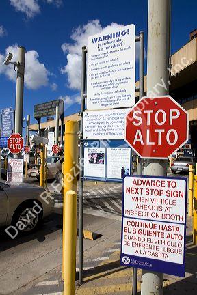Multilingual information signs at the United States port of entry at the Tijuana, Baja California, Mexico/San Diego, California border crossing.