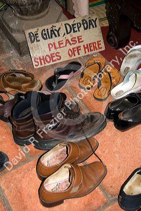 Shoes people have taken off to enter the Giac Lam Pagoda Buddhist temple in Ho Chi Minh City, Vietnam.