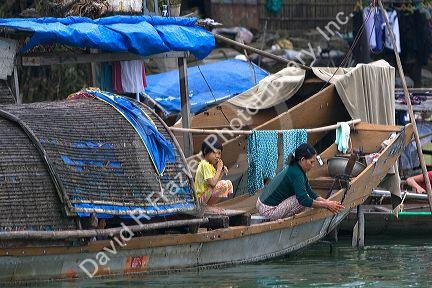 Vietnamese people living along the Perfume River at Hue, Vietnam.