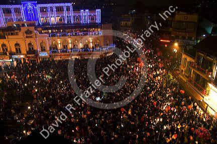 Crowds of people celebrate during Tet festivities in the historical center of Hanoi, Vietnam.