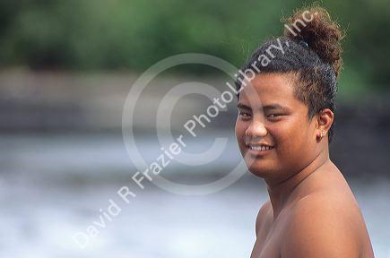 Hawaiian teenage boy with traditional hair.