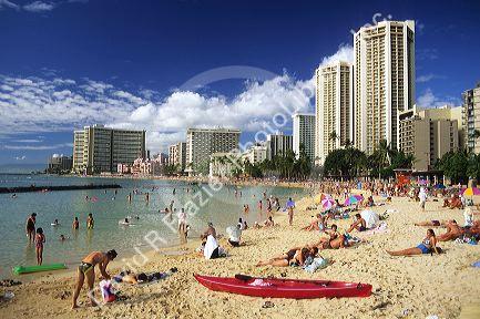 People on Waikiki Beach in Honolulu, Hawaii.