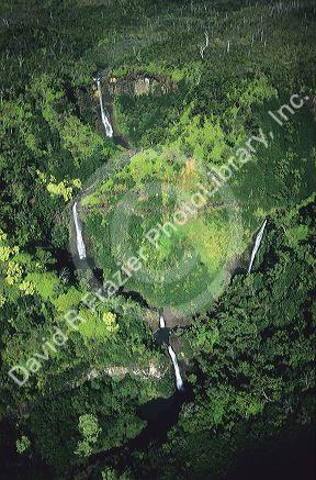 An aerial view of waterfalls on the island of Kauai, Hawaii.