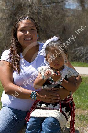 Portrait of a young Navajo Indian girl and her mother from Arizona, USA. MR