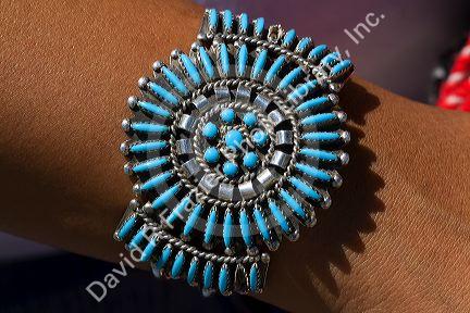 Turquoise bracelet crafted and worn by a Navajo Indian woman from Arizona, USA. MR