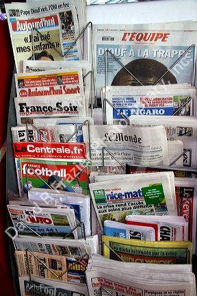 French language newspapers at an airport newsstand in Nice, France.