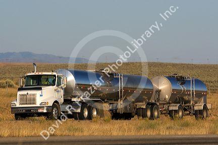 Double tank truck traveling on Interstate 84 near Boise, Idaho, USA.