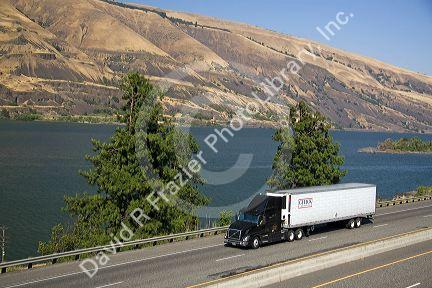 Truck transporting freight through the Columbia River Gorge near Hood River, Oregon, USA.