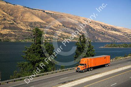 Truck transporting freight through the Columbia River Gorge near Hood River, Oregon, USA.