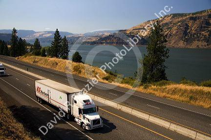 Truck transporting freight through the Columbia River Gorge near Hood River, Oregon, USA.