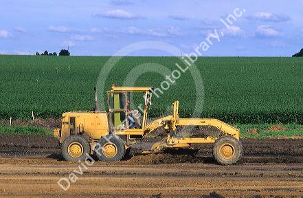 Road grader at road construction along state highway 60 in Northwest Iowa.