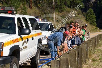 Injured rafter being rescued by paramedics on the South Fork of the Payette River in the Boise National Forest, Idaho, USA.