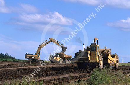 Earthmovers doing road construction along state highway 60 in Northwest Iowa.