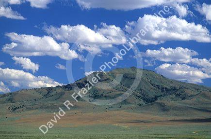 Cumulus clouds over Malheur County, Oregon high desert mountains.
