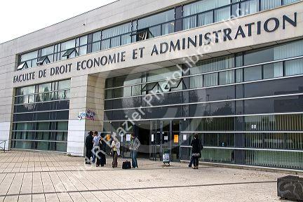 Students socialize in front of the Paul Verlaine University administrative building in Metz, France.