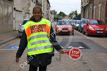 Female crossing guard in Toul, France.