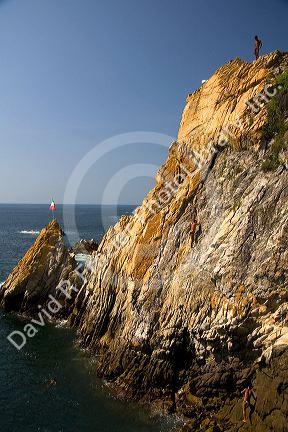 The La Quebrada Cliff Divers perform for the public from the cliffs of La Quebrada in Acapulco, Guerrero, Mexico.