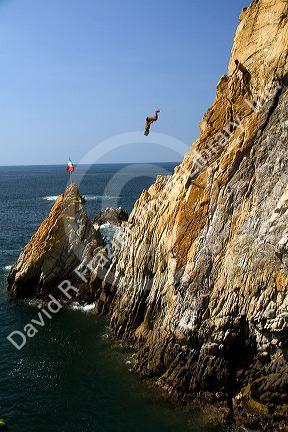 The La Quebrada Cliff Divers perform for the public from the cliffs of La Quebrada in Acapulco, Guerrero, Mexico.